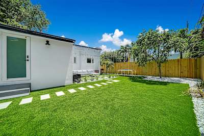 A rare find near Wynwood, enjoy a large private backyard with space for the entire group to gather and unwind.