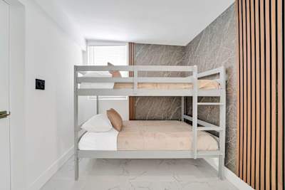 Cozy and functional sleeping arrangements designed for a restful night's sleep.