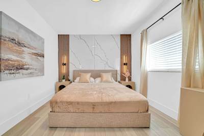 Enjoy a quiet night's rest in this inviting bedroom retreat.