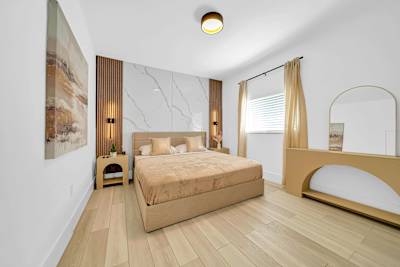 Comfort and convenience come together in this beautifully appointed bedroom