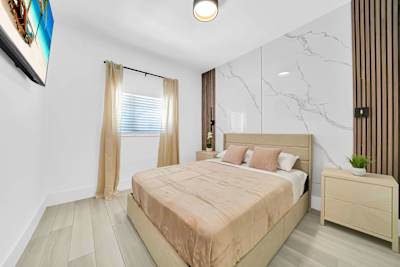 Soft linens, comfortable bedding, and a relaxing atmosphere await.