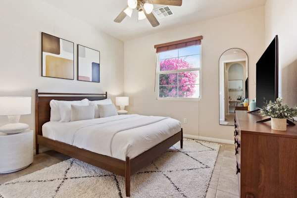 Second bedroom with a queen bed and desert vibes for restful nights.