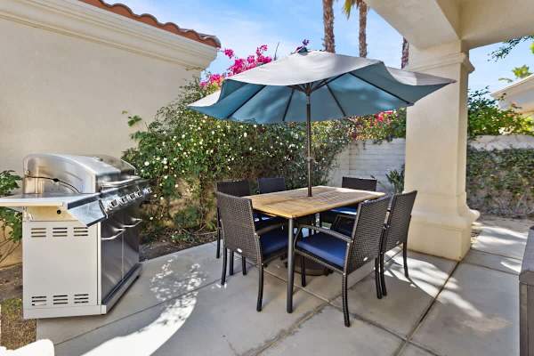 Share meals around this solid wood table with seating for the whole group.
