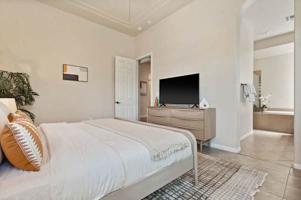 Simple elegance meets comfort in this peaceful primary bedroom retreat.