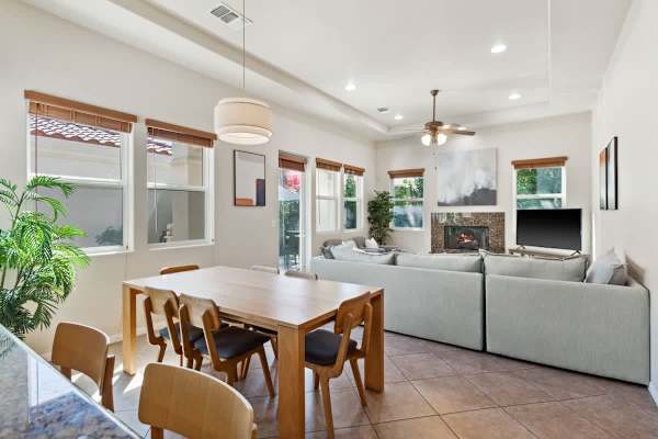 Share meals around this solid wood table with seating for the whole group.