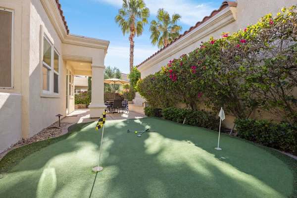 Practice your putting game on the private green right outside your door.