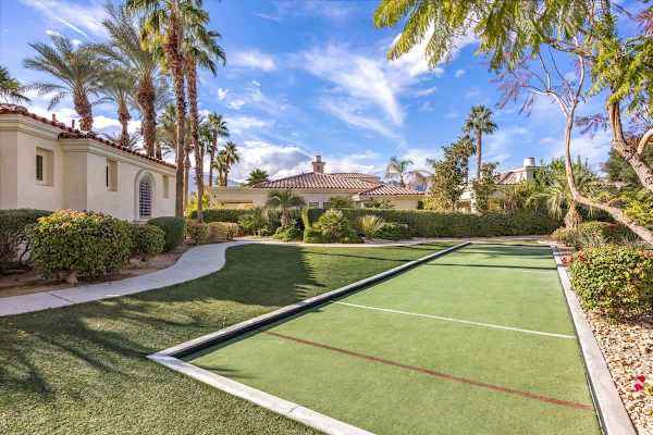 Bocce court and green lawn give you outdoor games right in the neighborhood.