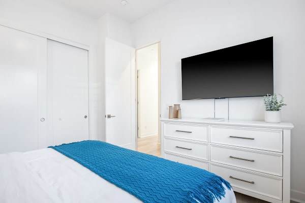 Relax in this comfortable bed and enjoy some TV.