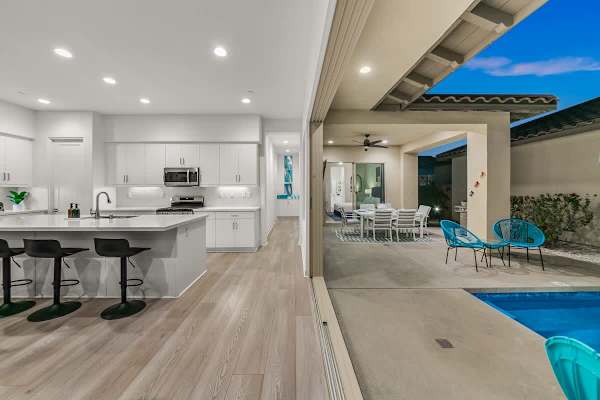Easy access to the pool just outside the dining area.