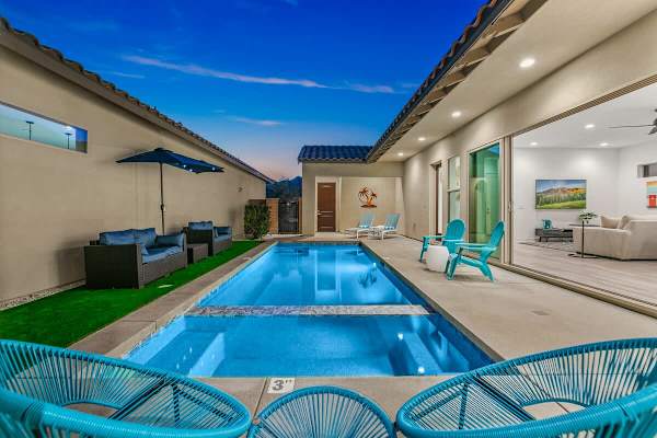 Take a seat by the pool and enjoy the starry night above.