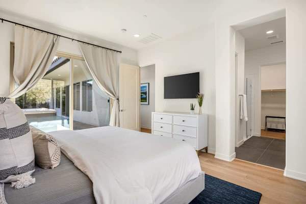 Step outside from your bedroom—private access to lawn and spa.