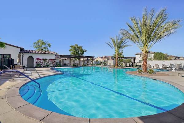 Plenty of seating available for you to enjoy the communal pool in utmost comfort.