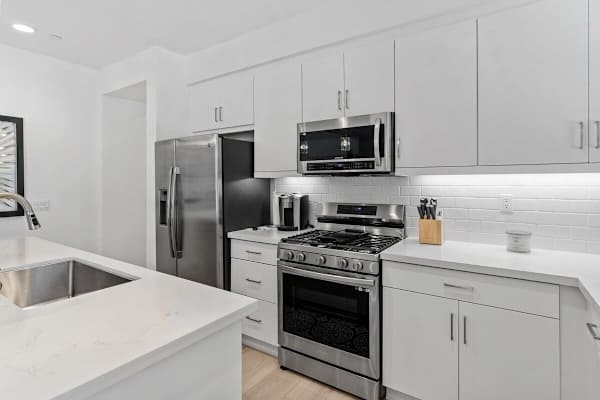 Stainless steel appliances and plenty of prep space for cooking.