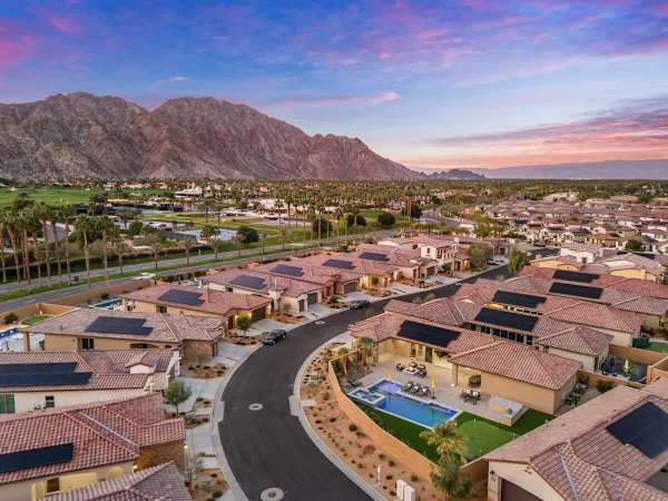 Your home in the community with mountains glowing at sunset all around.