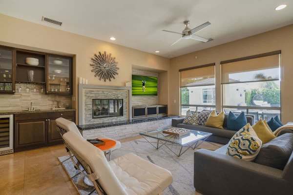 Sectional seating and vibrant pillows add warmth and personality.