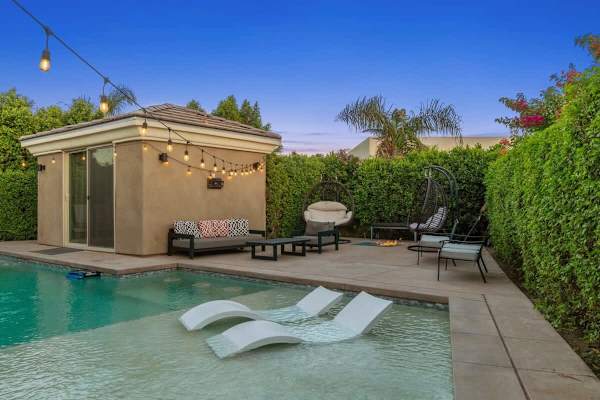 Ledge loungers in the pool catch the sun—covered seating keeps you shaded all afternoon long.