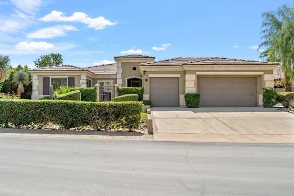 Welcome home to your desert retreat with convenient garage parking.