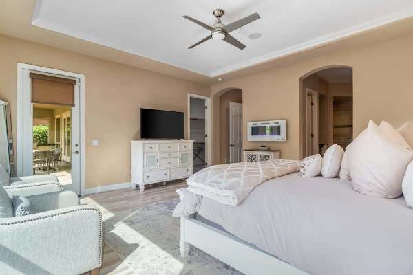 Primary bedroom opens to your backyard paradise.