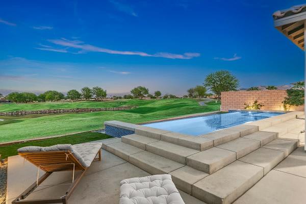 Watch golfers finish their rounds from your infinity pool.