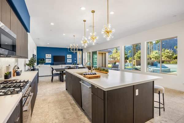 Bright and spacious kitchen with a view of the pool.