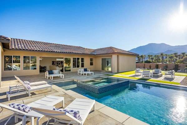 Sit on the loungers by the pool and enjoy the sun.