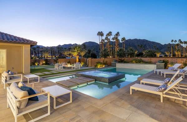 Backyard with a lounge area.