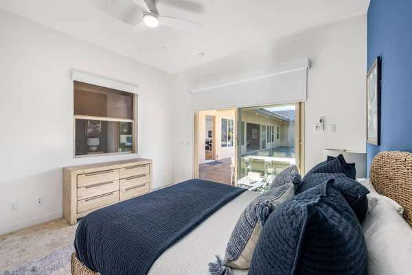 A queen bed and a clothing storage to keep your clothes nice and tidy.