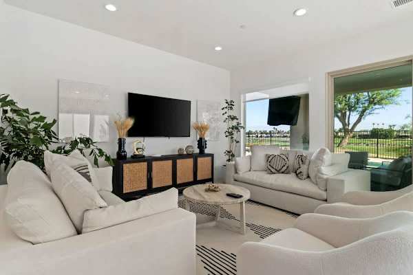 Sectional seating with golf course views.