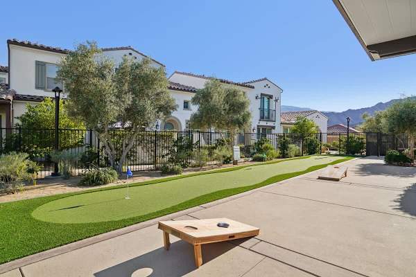 The corn-hole game will have you playing for a while. Rematch?