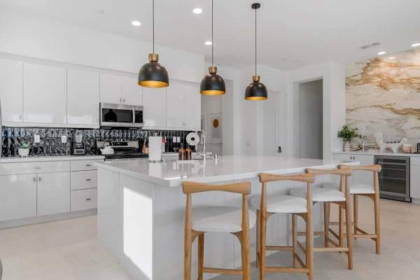 White island with natural wood stools.