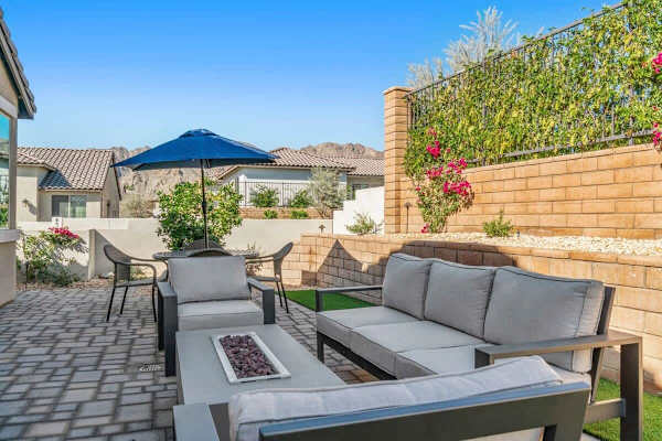 Fire pit table with mountain backdrop—roast marshmallows under desert skies nightly.