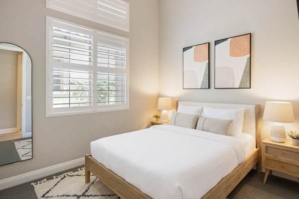 Bedroom 3, a bright space with a comfortable queen size bed.