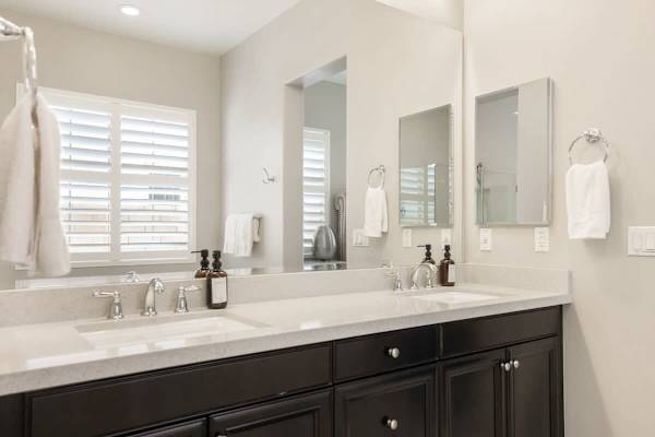 A bright double vanity designed for convenience.
