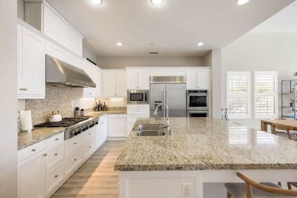 Bright kitchen with plenty of prep space for any meal.