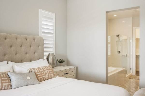 A soft, airy master suite perfect for recharging with your own bathroom.