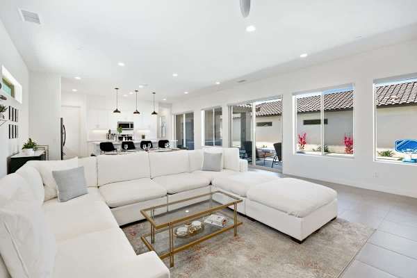 Soft natural light fills this easy, welcoming living room.