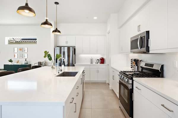 Bright counters and a clean, organized cooking space