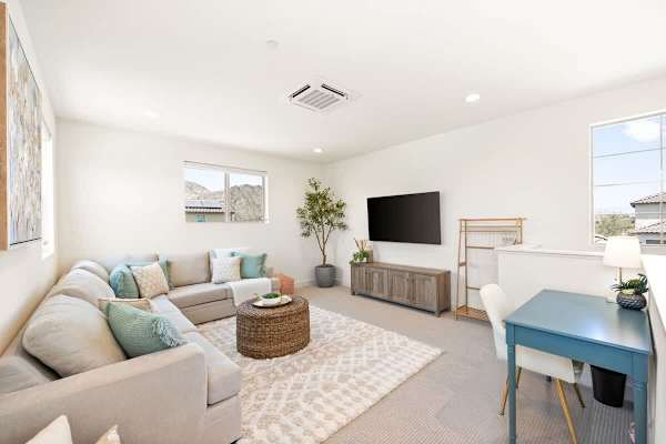 Bright and spacious living Room with a TV to sit back and relax.