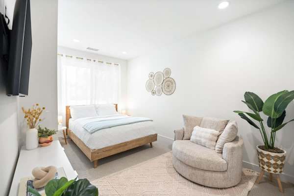 Bedroom 2 has a comfortable queen-size bed for a good night's sleep.