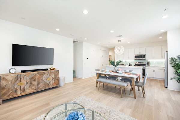 Bright, easy-flow space between the dining table and lounge area.