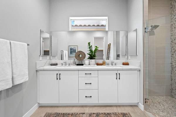 Bathroom with double vanity, walk-in shower, and soaking tub feels like your own private spa.