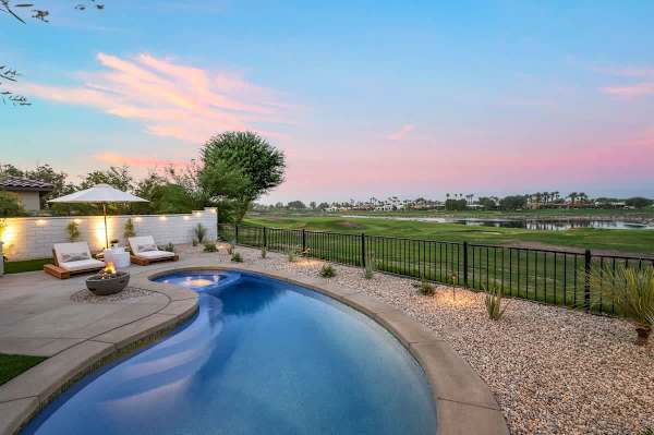 Staying cozy during chilly nights is made easy by the warmth of the fire pit.