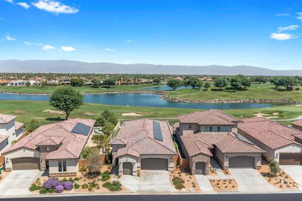This lakefront home offers private parking with EV charger and stunning views,