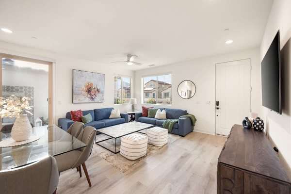 Open floor plan connects the kitchen, dining, and living areas.