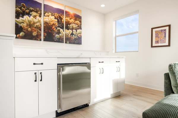 Kitchenette  makes late-night snacks easy for upstairs guests.