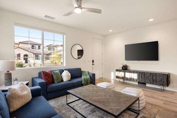 Living space with plenty of seating for movie nights or catching up with friends.