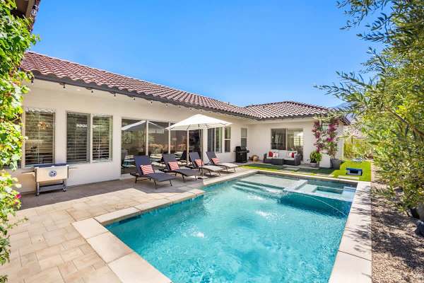 Bright daytime views around the pool area.