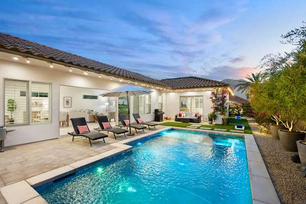 Soft lights make the pool and spa inviting during the evening.