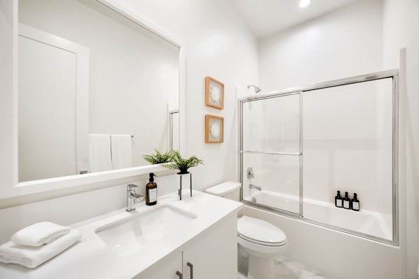 Suite 2 Bathroom has a shower/tub combo to freshen up to start your day.