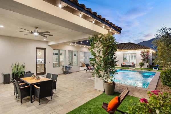 Admire the party lights surrounding the patio area.